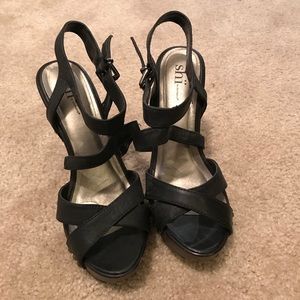 Black and brown high heels.